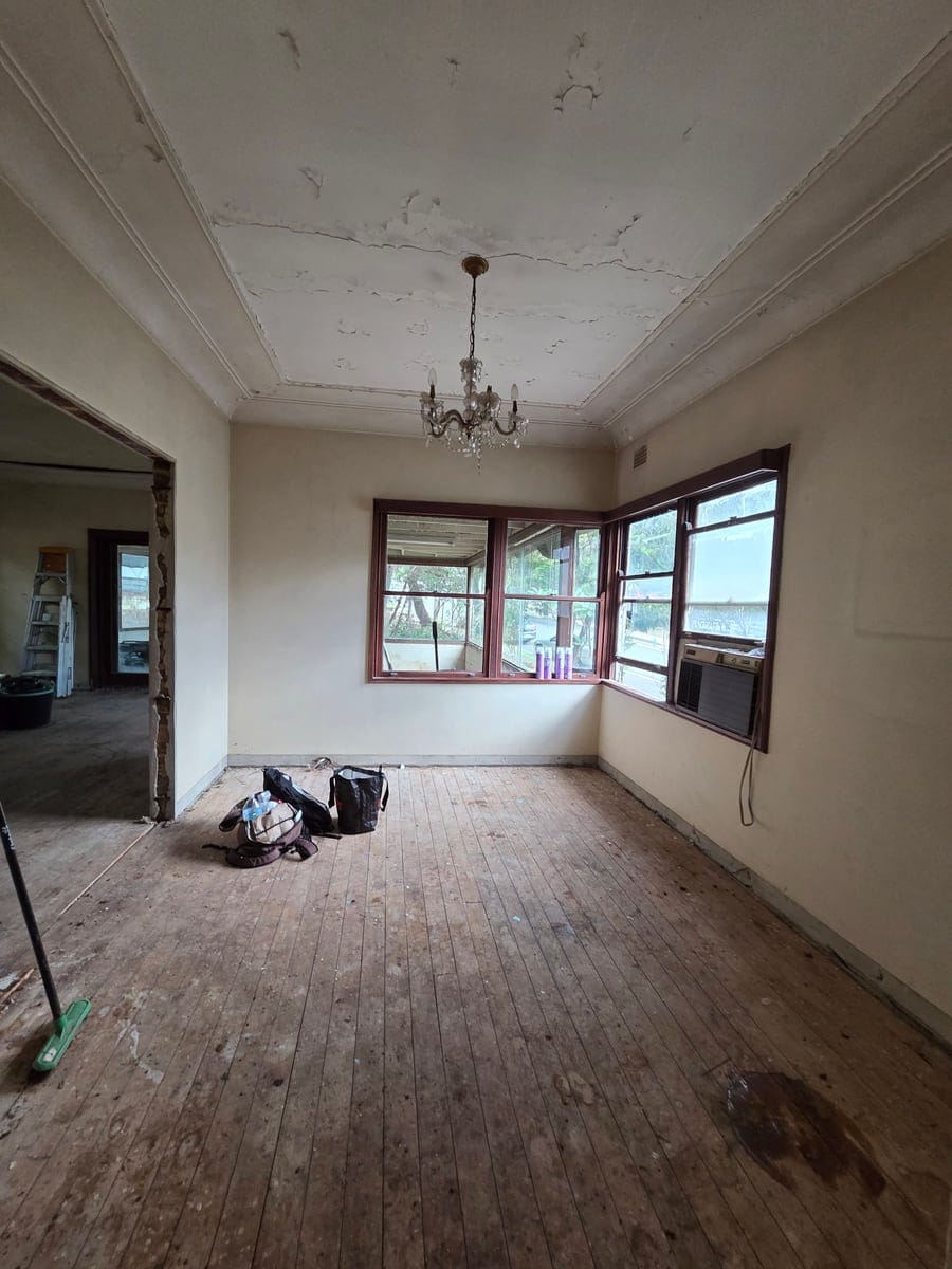 Cleared and stripped-out Sydney deceased estate living room ready for renovation or sale